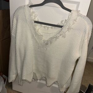 V-neck fringed distressed white sweater
